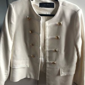 White jacket with gold buttons
